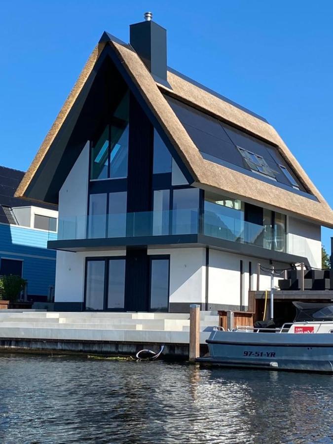 B&B Ganzendiep Aan Het Water Grafhorst Bagian luar foto